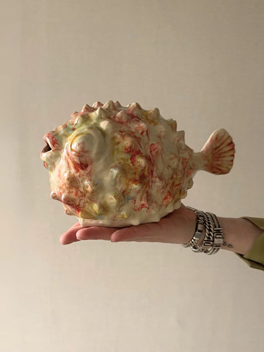 Aardewerk ornament vis