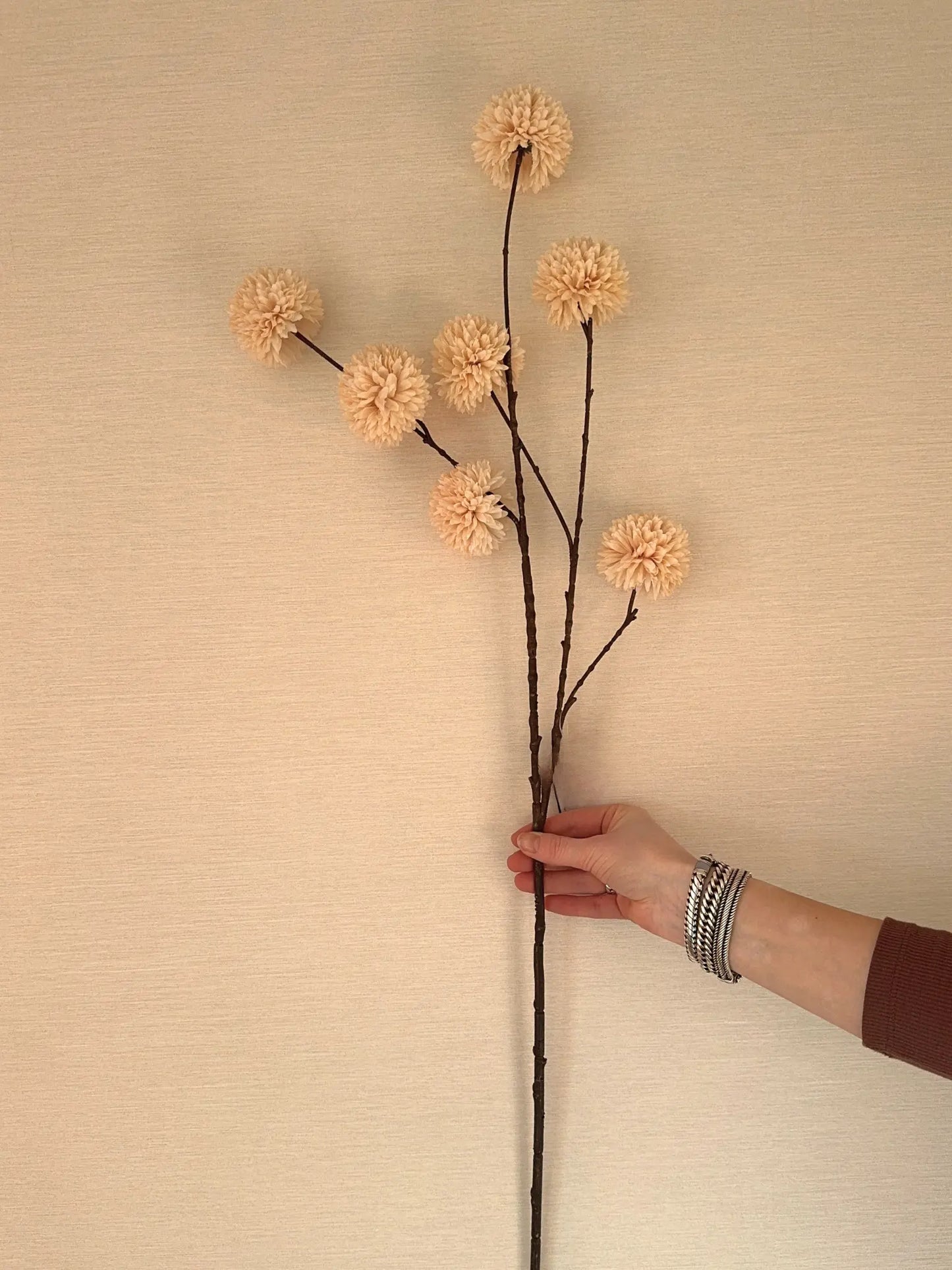 Kunstgroen pompom crème 98 cm